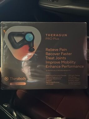 Therabody Theragun PRO Plus Percussion Massager in Black with Blue Accent